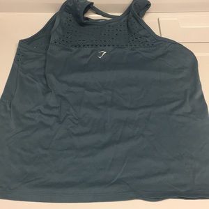 Combo Medium vest and bottom gym shark wore once